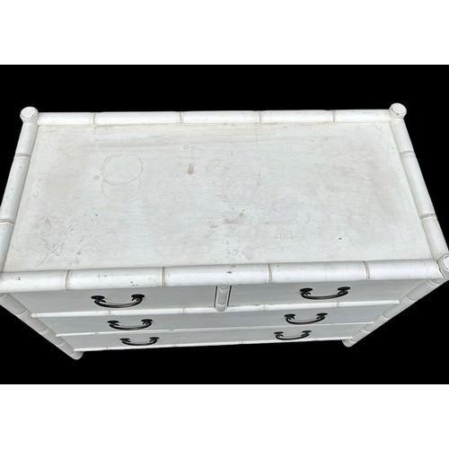 185 - AN OKA FAUX BAMBOO AND RATTAN CHEST IN WHITE, 

Two short over two long drawers with faux bamboo det... 