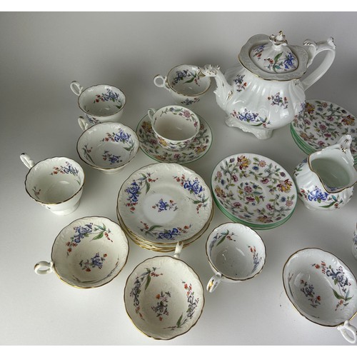 232 - A LARGE MIXED TEA SERVICE, including saucers by Minton 'Haddon Hall' and cups, saucers, tea pots, pl... 