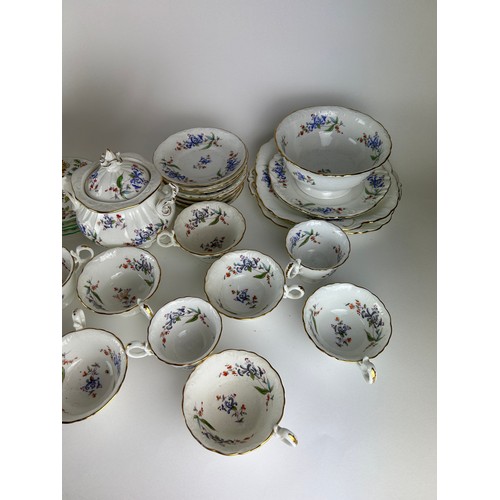 232 - A LARGE MIXED TEA SERVICE, including saucers by Minton 'Haddon Hall' and cups, saucers, tea pots, pl... 