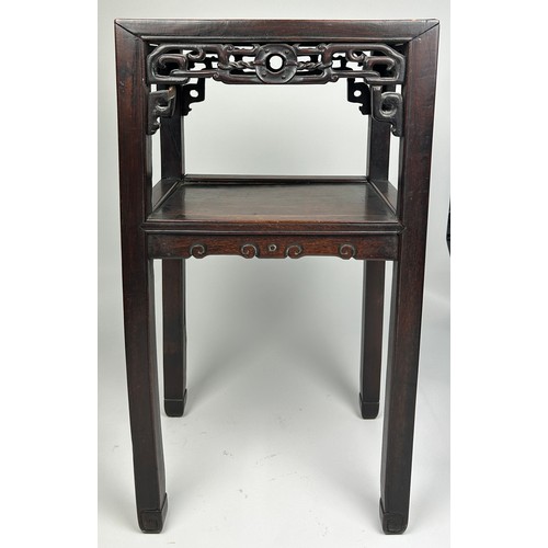 79 - AN EARLY 19TH CENTURY CHINESE ROSEWOOD TWO TIER TABLE, with intricate fretwork raised on four legs.
... 