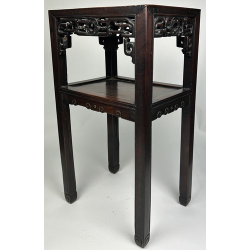 79 - AN EARLY 19TH CENTURY CHINESE ROSEWOOD TWO TIER TABLE, with intricate fretwork raised on four legs.
... 