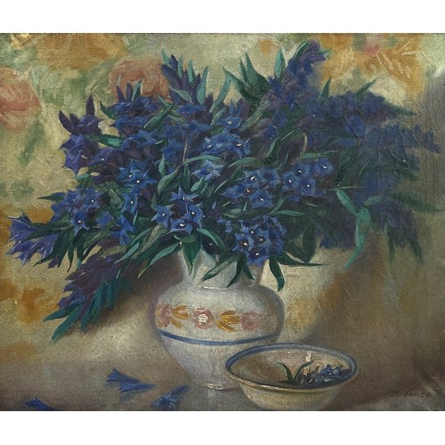 171 - AN OIL ON CANVAS STILL LIFE OF BLUE FLOWERS IN A VASE, mounted in a white frame. 

Signed indistinct... 