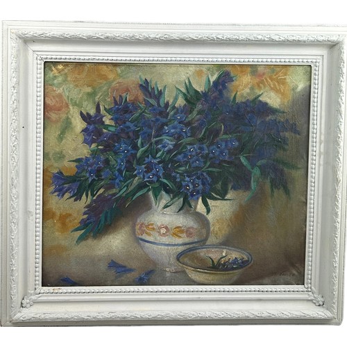 171 - AN OIL ON CANVAS STILL LIFE OF BLUE FLOWERS IN A VASE, mounted in a white frame. 

Signed indistinct... 