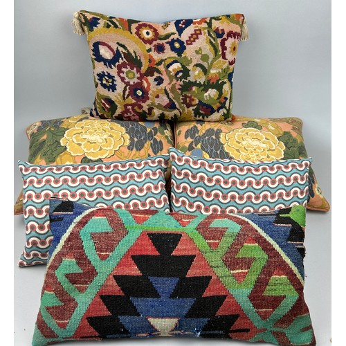 212 - A COLLECTION OF SIX CUSHIONS, to include two made from fabric purchased from textile dealer Su Mason... 