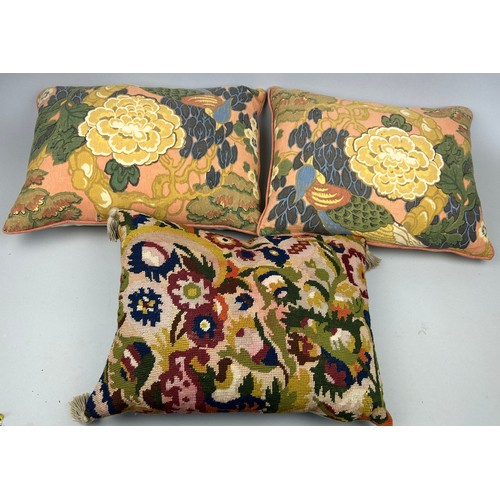 212 - A COLLECTION OF SIX CUSHIONS, to include two made from fabric purchased from textile dealer Su Mason... 