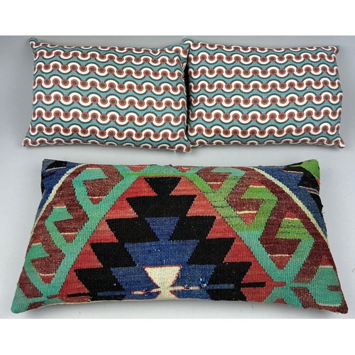 212 - A COLLECTION OF SIX CUSHIONS, to include two made from fabric purchased from textile dealer Su Mason... 