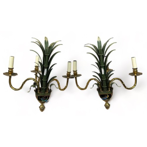 216 - ATTRIBUTED TO MAISON CHARLES A PAIR OF HOLLYWOOD REGENCY TOLEWARE AND BRASS PINEAPPLE WALL SCONCES, ... 