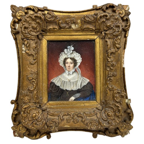 117 - A PORTRAIT MINIATURE WATERCOLOUR ON IVORY DEPICTING A LADY, 

Painted in the Georgian manner. The la... 