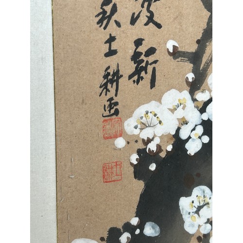 83 - A CHINESE WATERCOLOUR ON SILK DEPICTING BLOSSOM TREES, with calligraphy to left hand side

152cm x 5... 