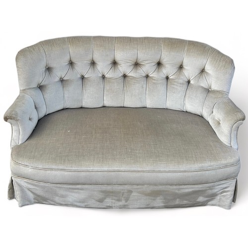 184 - A VICTORIAN BUTTON BACK TWO SEATER SOFA, upholstered in neutral fabric 

140cm x 80cm x 60cm