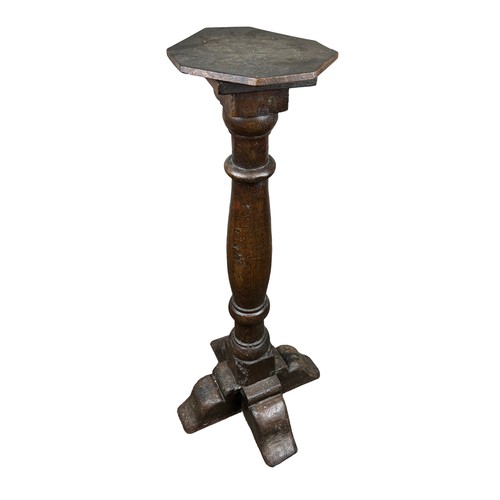 200 - A TORCHERE MADE FROM A LEG OF AN 18TH CENTURY REFECTORY TABLE

87cm in height

**Please note this lo... 