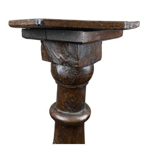 200 - A TORCHERE MADE FROM A LEG OF AN 18TH CENTURY REFECTORY TABLE

87cm in height

**Please note this lo... 