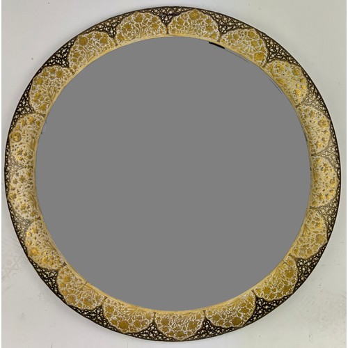 203 - A LARGE KASHMIRI CIRCULAR WALL MIRROR OF RADIANT FOLIATE DESIGN, circa 1900 

66cm in diameter