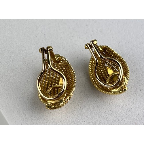 31 - A PAIR OF 18CT GOLD CLIP-ON EARRINGS, 

Total weight: 7.6gms

Marked for 750. 

16mm x 10mm each