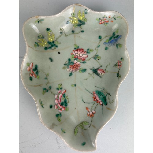 98 - A CHINESE CELADON LOBED LEAF SHAPED DISH DECORATED WITH PINK FLOWERS AND CRICKETS

26cm x 19cm x 6cm