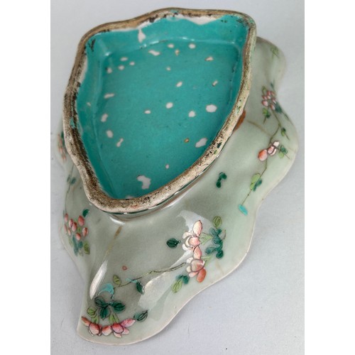 98 - A CHINESE CELADON LOBED LEAF SHAPED DISH DECORATED WITH PINK FLOWERS AND CRICKETS

26cm x 19cm x 6cm