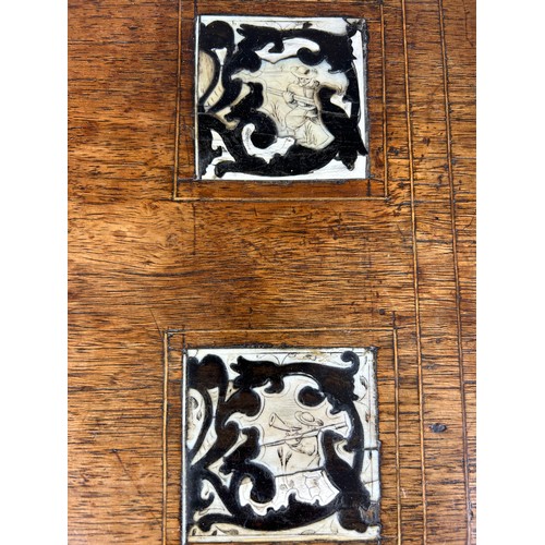 369 - AN 18TH CENTURY SPANISH WALNUT OCCASIONAL TABLE,

Ivory and ebony inlay in twelve squares on four sp... 