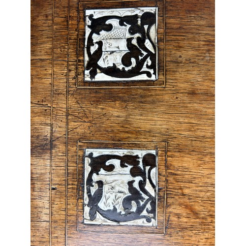 369 - AN 18TH CENTURY SPANISH WALNUT OCCASIONAL TABLE,

Ivory and ebony inlay in twelve squares on four sp... 