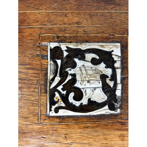 369 - AN 18TH CENTURY SPANISH WALNUT OCCASIONAL TABLE,

Ivory and ebony inlay in twelve squares on four sp... 