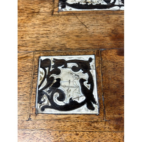 369 - AN 18TH CENTURY SPANISH WALNUT OCCASIONAL TABLE,

Ivory and ebony inlay in twelve squares on four sp... 