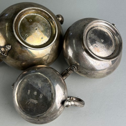 61 - A SILVER AND GILT TEA SET BY ROBERT GARRARD II GIFTED FROM THE ATHENEUM CLUB IN PALL MALL TO THE BUT... 