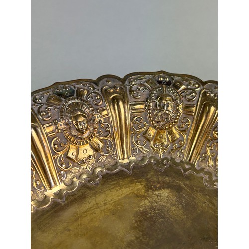 62 - A SILVER GILT DISH WITH MASKS OF CLASSICAL FIGURES, 

Hallmarked to verso JH, Manchester silver. 

W... 