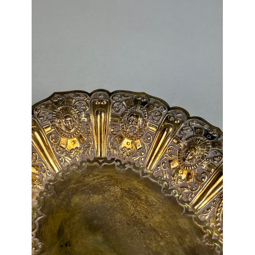 62 - A SILVER GILT DISH WITH MASKS OF CLASSICAL FIGURES, 

Hallmarked to verso JH, Manchester silver. 

W... 