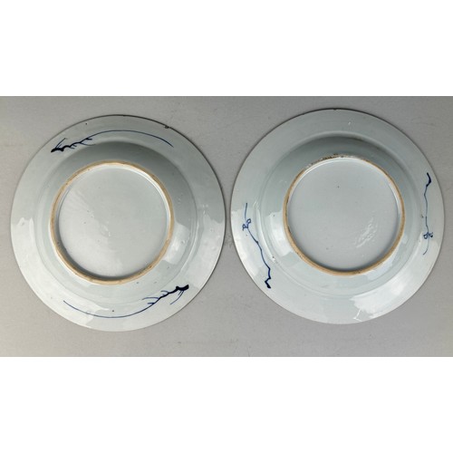 86 - A PAIR OF CHINESE KANGXI PERIOD (1662-1722) 'CHICKEN DISHES', 

Blue and white painted with scenes o... 