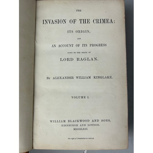 493 - A COLLECTION OF ANTIQUE LEATHER AND CLOTCH BOUND BOOKS ON THE RUSSIAN AND CRIMEAN WAR, along with a ... 