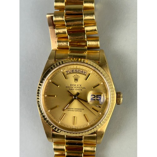 23 - A GENTLEMAN'S 18CT GOLD ROLEX OYSTER PERPETUAL DAY-DATE WRISTWATCH, in working order.

Insurance val... 
