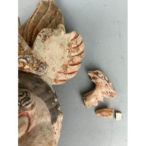 96 - THE HEAD FROM A LARGE CHINESE POTTERY GUARDIAN FIGURE TANG DYNASTY (AD 618-907). 

The biscuit face ... 