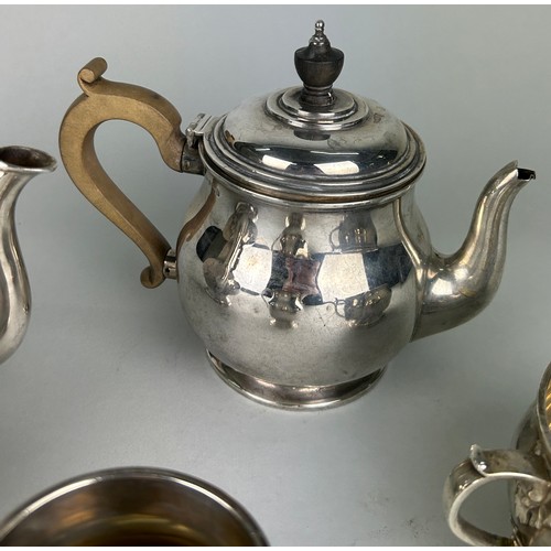 61 - A LONDON SILVER TEA SERVICE MOSTLY BY RICHARD COMYNS, 

Comprising a tea pot, milk pail and sugar bo... 