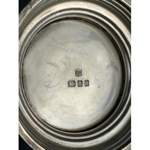 61 - A LONDON SILVER TEA SERVICE MOSTLY BY RICHARD COMYNS, 

Comprising a tea pot, milk pail and sugar bo... 