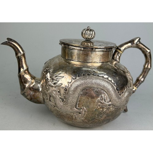 63 - A CHINESE EXPORT SILVER TEA SET WITH FOUR CLAWED DRAGONS MARKED HC MOST PROBABLY HUNG CHONG AND CO O... 