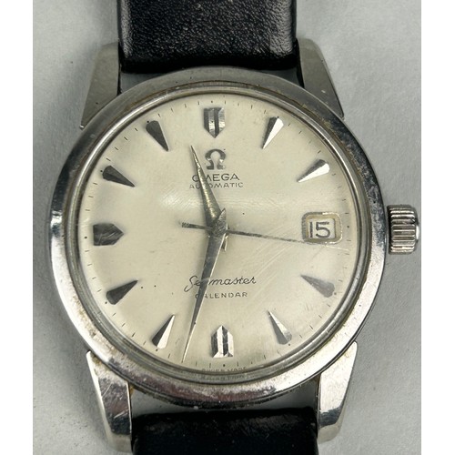 50 - AN OMEGA AUTOMATIC SEAMASTER CALENDAR WATCH, 

Strap not original. Scratches and marks throughout, n... 