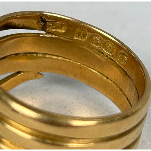 42 - AN 18CT GOLD RING IN THE FORM OF A SNAKE WITH TWO SMALL DIAMONDS FOR EYES, 

Weight: 10.8gms