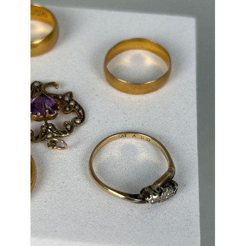 43 - A COLLECTION OF GOLD RINGS, 

To include: two 22ct marked gold wedding bands (7.3gms) 

One tested 1... 