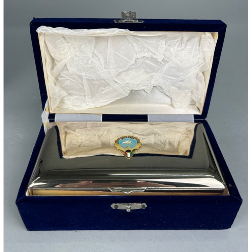 66 - A SILVER PRESENTATION CASKET FROM THE UNITED ARAB EMIRATES, 

The silver box was a gift from His Hig... 