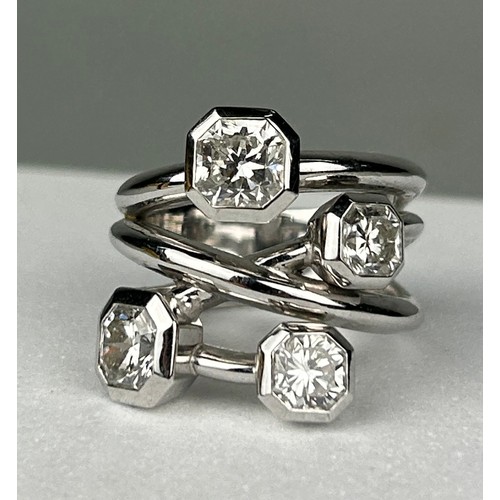 1 - A PLATINUM RING SET WITH FOUR CORNER SQUARE 'LUCIDA' DIAMONDS, The diamonds purchased from Tiffany a... 