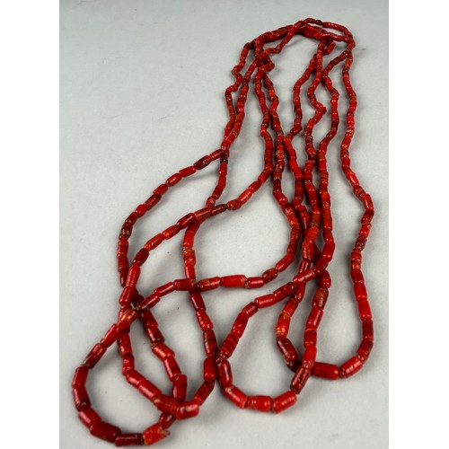 24 - A PAIR OF ANTIQUE DEEP RED CORAL NECKLACES, possibly South African.

58cm length each.