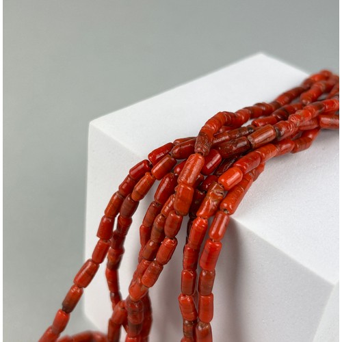 24 - A PAIR OF ANTIQUE DEEP RED CORAL NECKLACES, possibly South African.

58cm length each.