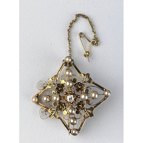 15 - A VICTORIAN FOUR-SIDED DIAMOND SHAPED BROOCH ON 14CT GOLD CHAIN SET WITH SEED PEARLS AND A CENTRAL D... 