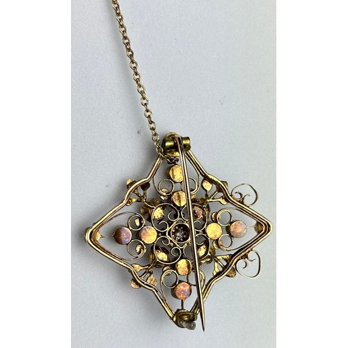 15 - A VICTORIAN FOUR-SIDED DIAMOND SHAPED BROOCH ON 14CT GOLD CHAIN SET WITH SEED PEARLS AND A CENTRAL D... 