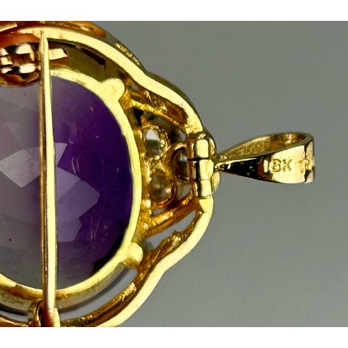 17 - AN AMETHYST AND 18CT GOLD BROOCH WITH SMALL DIAMOND SET SHOULDERS. Insurance valuation from Philip A... 