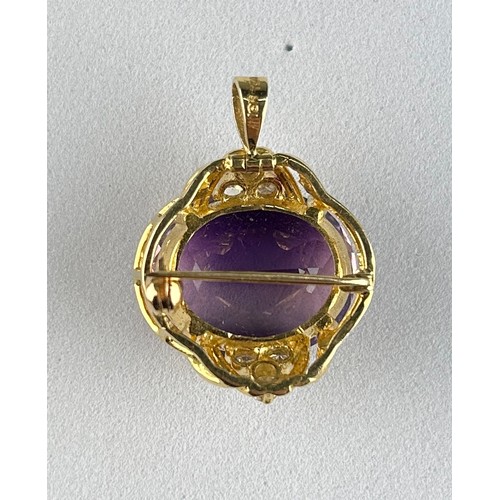 17 - AN AMETHYST AND 18CT GOLD BROOCH WITH SMALL DIAMOND SET SHOULDERS. Insurance valuation from Philip A... 