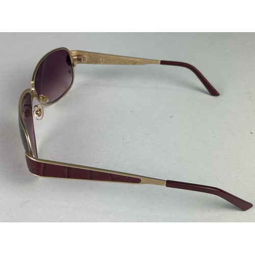 57 - A PAIR OF CARTIER EDITION C GOLD COLOUR RIMMED SUNGLASSES, with faux burgundy crocodile skin detail,... 