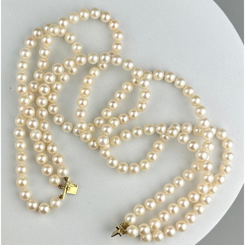 9 - A NECKLACE OF CULTURED PEARLS, JOINED BY A 14CT GOLD, DIAMOND CLASP SET WITH A BLUE STONE, This piec... 