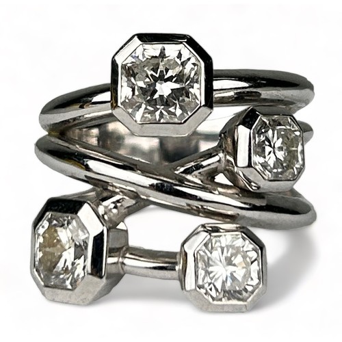 1 - A PLATINUM RING SET WITH FOUR CORNER SQUARE 'LUCIDA' DIAMONDS, The diamonds purchased from Tiffany a...