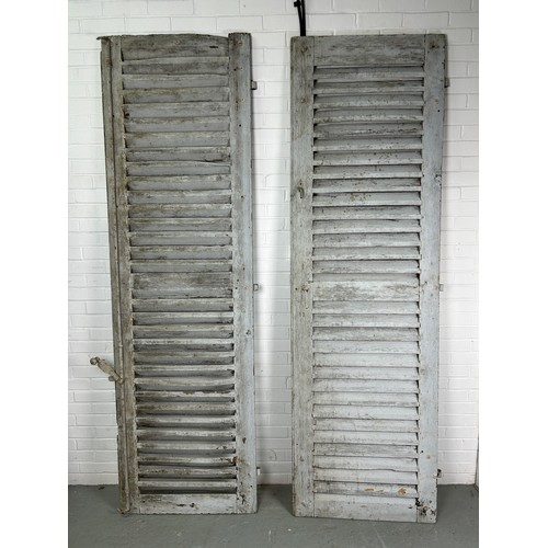 522 - A PAIR OF VERY LARGE INDIAN GREY PAINTED SHUTTERS (2)