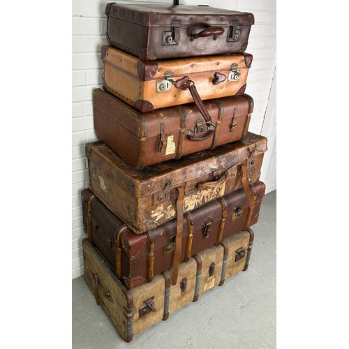 514 - A COLLECTION OF SIX ANTIQUE SUITCASES AND TRUNKS OF VARYING SIZES (6)